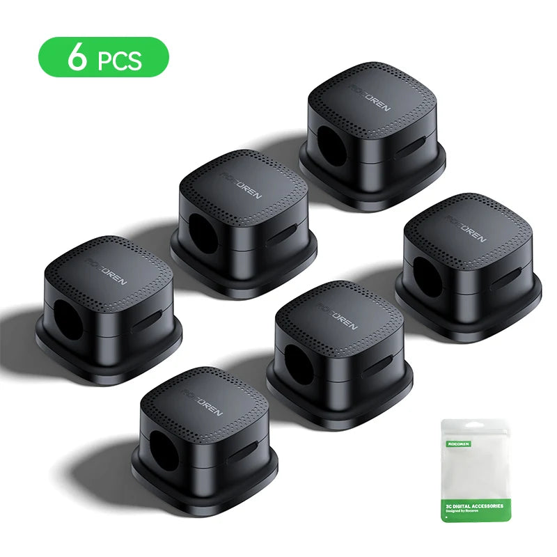 Diskret sort kabelholder til minimalistisk desk setup